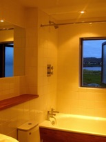downstairs bathroom, oak shelf and bath panelling